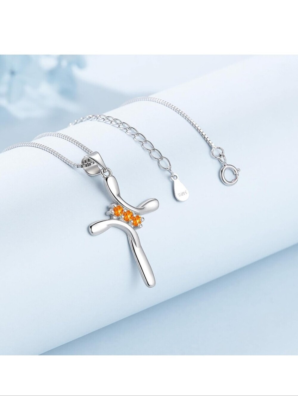 Sterling Silver Cross Necklace with Orange Gem Accents